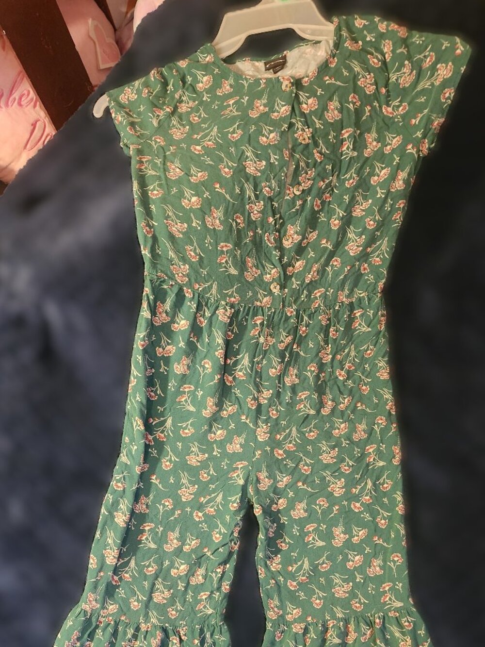 Art Class Green girl's floral jumpsuit with ruffle leg detail. Size 10/12